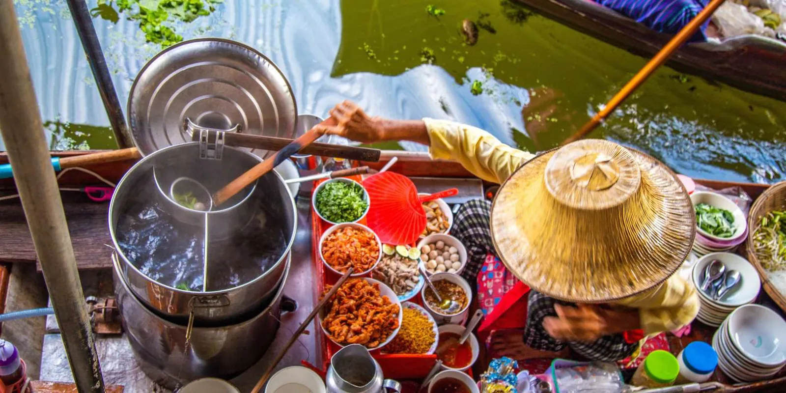 Cooking equipment and food in a market boat
