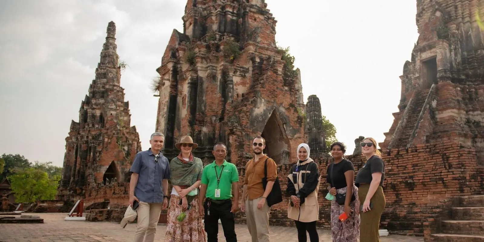 Tour group in front of Ayutthaya temple ruins