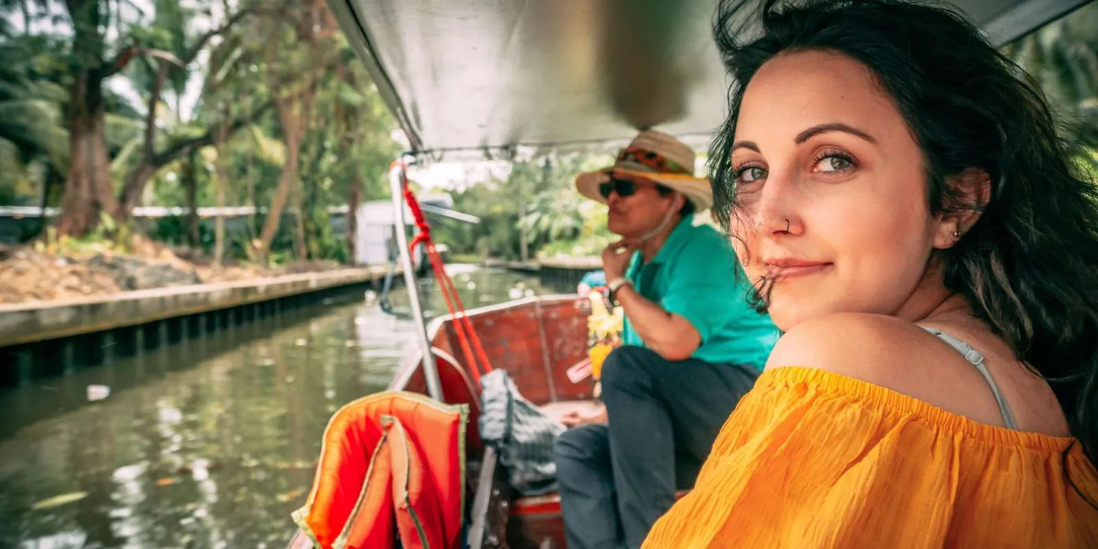 Passenger on a longtail boat journey