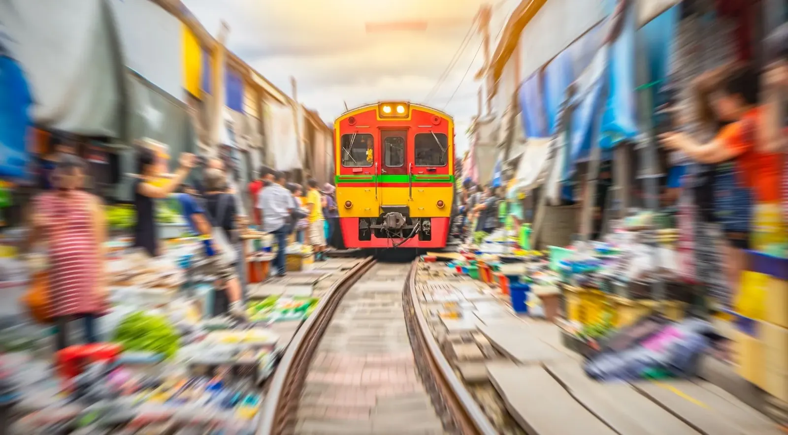 Train approaching through the railway market