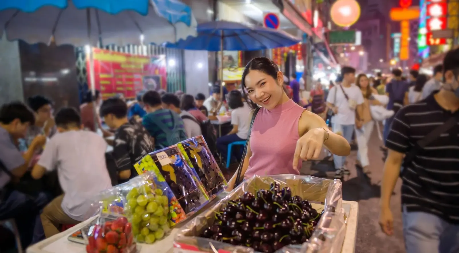 Illustrative evening food-market stalls