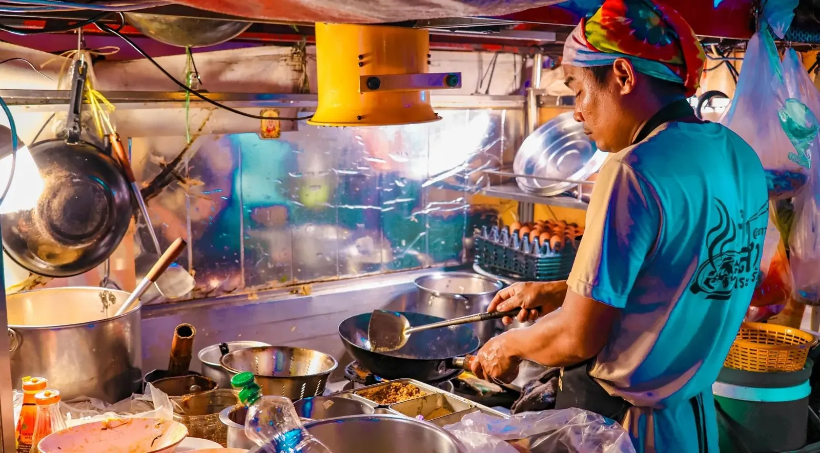Street-food stall and cooking pans